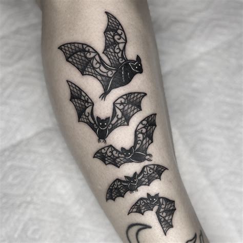 tiny bat tattoo